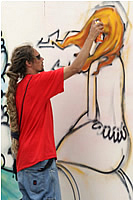 Finishing touches to graffiti art form