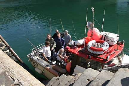 Catching a big smile! - Fishing at Clovelly Harbour