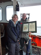 Lauren Davis from DWT and Darren Burrett from Surf School SW collect the T-Pod  photo copyright DWT
