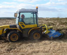 Les Deadman driving the new Pasquali tractor photo copyright DWT