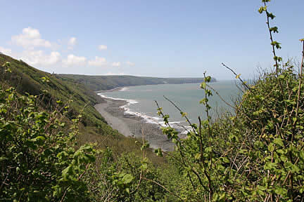 Going round the bend -  Hartland Point in the distance